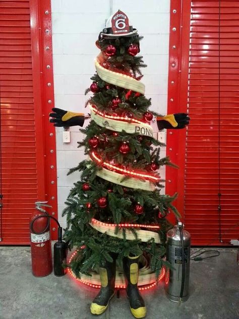 Fire tree.  Found my tree for this year.  I wonder if it would look good with my tinsel tree. Ems Christmas Tree, Firefighter Inspiration, Fire Department Christmas, Fire Department Decor, Firefighter Room, Firefighter Crafts, Firefighter Christmas, Firefighter Family, Firefighter Gear