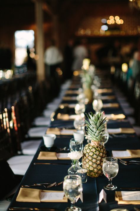 pineapple table setting...we wanted the decor to be minimal and to compliment beautiful Boone Hall; as mentioned in another photo, our total floral costs came to $600 because we kept it simple with pineapples and white mums on the tables and did wildflower style bouquets.  Thanks to Ooh Events and Snyder Rentals for the beautiful chairs/chandeliers and linens.  { Boone Hall Cotton Dock Wedding Wedding Budget Excel, Dock Wedding, Navy Blue Wedding Theme, Pineapple Centerpiece, Pineapple Wedding, Themed Wedding Decorations, Beach Wedding Decorations Reception, Wedding Hawaii, Havana Nights