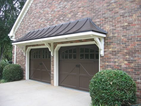 Metal roof bracket portico over double garage doors. Designed and built by Georgia Front Porch. Front Door Overhang, Metal Garage Doors, Double Garage Door, Portico Design, Door Overhang, Garage Pergola, Metal Awning, Garage Door Types, Garage Roof