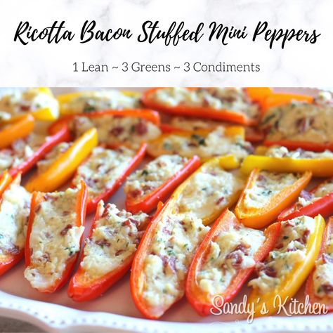 The savory taste of turkey bacon paired with creamy ricotta, fresh herbs and a variety of cheese pairs so well with the sweetness of mini bell peppers. Serve this colorful delicious appetizer at your next gathering! Mini Stuffed Peppers, Cooking Turkey Bacon, Lean Protein Meals, Mini Peppers, Lean And Green, Stuffed Mini Peppers, Sweet Peppers, Lean Meals, Lean And Green Meals