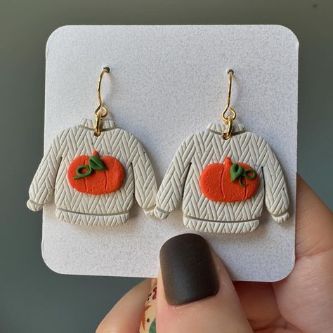 🥹So tiny. Very demure. Very cutesy. . Making tiny earring sweaters is honestly one of my favorite things in the fall and winter collections of handmade polymer clay earrings . These are both in the Fall Ya’ll Collection and in the shop now! . #polymerclay #polymerclayearrings #earringshop #handmadeearrings #handmadejewlery #fall #fallfashion Clay Earrings Ideas, Fall Polymer Clay Earrings, Fall Polymer Clay, Sweater Earrings, Hobby Ideas, Handmade Jewlery, Tiny Earrings, My Favorite Things, In The Fall