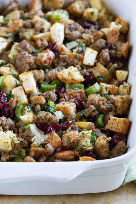 All of the flavors of fall come together in this Apple Cranberry and Sausage Dressing for the perfect holiday dressing recipe. Holiday Stuffing Recipes, Cranberry Stuffing, Sausage Cornbread Stuffing, Sausage Stuffing Recipe, Fresh Herb Recipes, Gluten Free Stuffing, Stuffing Recipes For Thanksgiving, Sausage Stuffing, Herb Stuffing