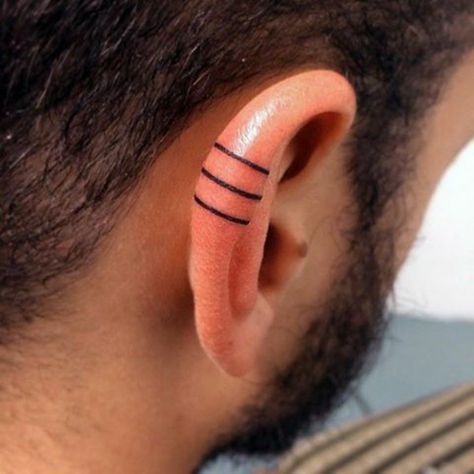 Helix Tattoo Trend Is Taking Over Instagram, And These 10+ Pics Will Make You Want To Get One Too On Ear Tattoo, Ear Lobe Tattoo, Helix Tattoo, Men Symbol, Tattoos Ear, Inner Ear Tattoo, Tattoos 2024, Men Masculine, Behind Ear Tattoos