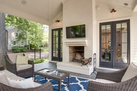 Custom Home Relaxed Outdoor Patio Back Porch French Doors Patio, Interior Exterior Fireplace, Shared Indoor Outdoor Fireplace, French Doors Fireplace, Vaulted Screened Porch With Fireplace, French Doors Beside Fireplace, French Doors Next To Fireplace, Fireplace With Patio Doors On Each Side, Fireplace Flanked By French Doors