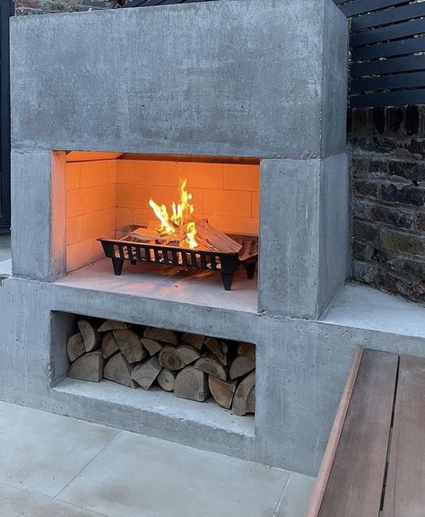 Master Courtyard, Fireplace With Log Storage, Nordic Fireplace, Concrete Outdoor Fireplace, Fireplace Box, Garden Fireplace, Modern Outdoor Fireplace, Log Storage, Court Yard