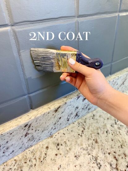 Wanting to update your kitchen without breaking the bank? This DIY project only requires a few supplies and can be done in an afternoon! Paint the outdated backsplash you currently have and save some major cash! Painting Peel And Stick Backsplash, Painted Tile Kitchen Backsplash, Paint Tile Backsplash Kitchen, Paint Backsplash Tile Before And After, Painting Kitchen Tile Backsplash, Painted Backsplash Kitchen, Painted Kitchen Backsplash Ideas, Diy Painted Backsplash, Painting Backsplash Tile