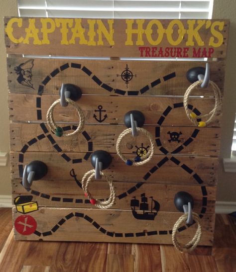 Carnival Game - Captain Hook's Treasure Map Ring Toss made from Pallet and Cricut Vinyl Captain Hook Ring Toss Game, Pirate Carnival Games, Captain Hook Ring Toss, Disney Carnival Games, Carnival Game Ideas, Halloween Carnival Games, Diy Carnival Games, Fall Festival Games, Carnival Games For Kids