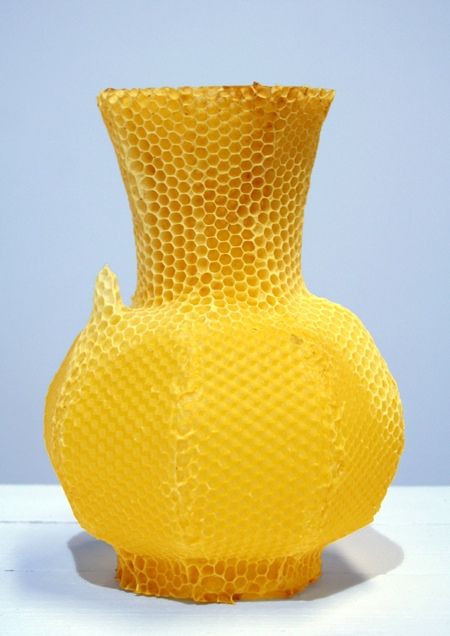 A honeycomb vase, made by bees!   "Libertiny made a vase-shaped hive that the bees then colonised, building a hexagon comb around it. The wax sheets used to make the hive were embossed with a honeycomb pattern to help the bees on their way.  Libertiny calls the process slow prototyping - it took 40,000 bees a week to make the vase. Since the bees get aggressive when they are interrupted, Libertiny had to guess when it was time to remove the vase." Honeycomb Vase, Living Colors, Growth And Decay, I Love Bees, Honeycomb Pattern, Save The Bees, Bees Knees, Mellow Yellow, Shades Of Yellow