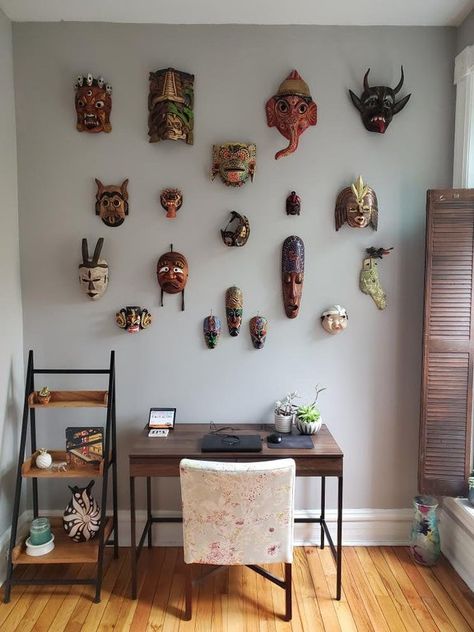 Wall Of Masks Decor, Mexican Wall Decor Living Room, Wall Masks Decor, Masks On Wall, Wall In The Living Room, Africa Decor, Mask Wall Decor, Living Room Ceiling Wallpaper, African Inspired Decor