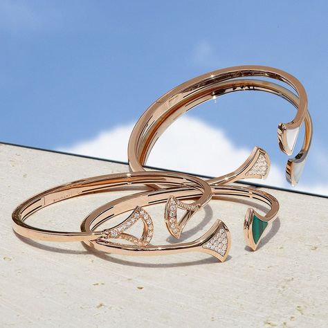 BVLGARI on Instagram: “Summer’s siren call. The bracelets of the Divas’ Dream collection speak decadently to your inner diva. Their Roman-inspired fan motifs are…” Bvlgari Divas Dream, Siren Call, Instagram Summer, Diva, Gold Bracelet, Wedding Dresses, Fan, Gold, On Instagram