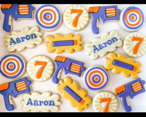 Nerf Cookies Decorated, Nerf Cookies, Number 7 Cookies Royal Icing, Nerf Party Food, Nerf Birthday Shirt, Nerf Theme Treats Table, Nerf Birthday Invitations, Nerf Cake, Nerf Birthday Party