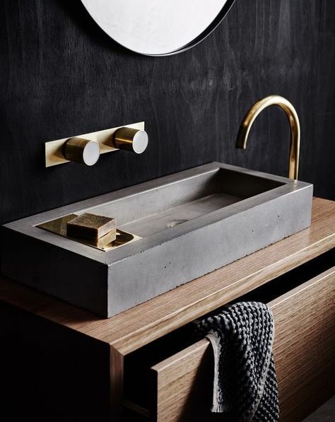 a wooden vanity with a concrete sink and brass details look chic #modernbathroom #homeideas Minimalist Dekor, Concrete Sink, Bad Inspiration, Bath Room, The Design Files, Bathroom Toilets, Bathroom Faucet, Counter Top, Design Case