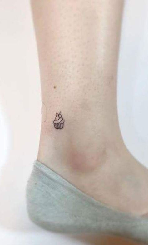 tiny perfect line cupcake tattoo... Tiny Baking Tattoo, Cute Cupcake Tattoo, Baking Related Tattoos, Small Dessert Tattoo, Tiny Cake Tattoo, Tiny Cupcake Tattoo, Mini Cake Tattoo, Mini Cupcake Tattoo, Small Cake Tattoo