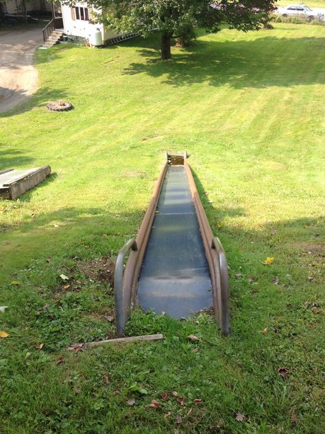 Look at that slide built into the hill! Slide On Hill, Backyard Slide, Backyard Play Spaces, Diy Slides, Kids Yard, Swiss Cottage, Pink Diy, Play Area Backyard, Pink Look