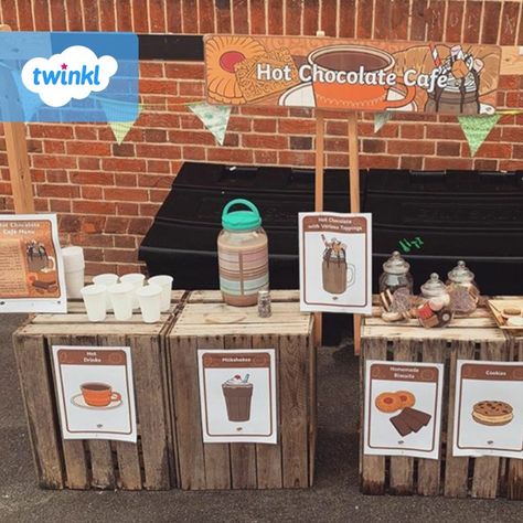 We're obsessed with this hot chocolate cafe that Lampton Park Preschool have created 😍 The campfire is a great final touch too 🔥 We’ll be over for a (socially distanced) cup of hot chocolate soon 😉💙  If you're inspired to create your own, click to download our Hot Chocolate Cafe role play pack, it has everything you need to set up shop. 

#hotchocolate #cafe #teachingresources #teaching #teacher #twinkl #twinklresources #eyfs #earlyyears #eyfsteacher #classroomideas #classroleplay #parents Cafe Eyfs Role Play, Coffee Shop Role Play Eyfs, Hot Chocolate Role Play Eyfs, Gruffalo Cafe Role Play, Christmas Roleplay Eyfs, Cafe Role Play Area Eyfs, Cafe Nursery, Cafe Role Play Area, Cafe Role Play