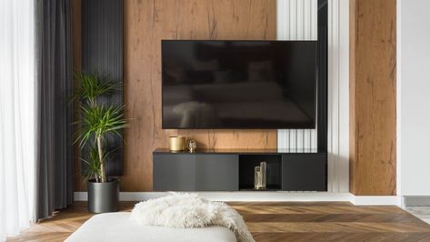 7 clever ways to decorate around a TV | Tom's Guide Black Track Lighting, Track Lighting Kits, Loft Stil, Timber Panelling, Arched Floor Lamp, Adjustable Height Table, Beachcrest Home, Flush Mount Lighting, Commercial Interiors