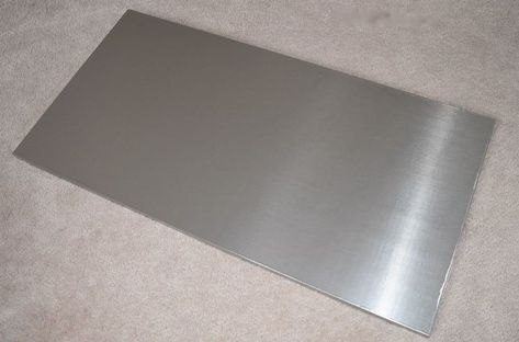 DIY Faux Metal Coffee Table | HometalkWrap tabletop with EZFaux Décor's stainless steel film. It's similar to applying contact paper, but is way more durable, and thick, and is a much higher quality than contact paper. Check out their Youtube channel to see how to apply it. Zinc Sheet Metal Table Top, Ikea Lack Coffee Table, How To Weld, Lack Coffee Table, Diy Stock Tank, Faux Metal, Painted Coffee Tables, Rattan Coffee Table, Expensive Furniture