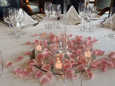 Rose petals table decoration Rose Petals Centerpiece Wedding, Rose Petal Centerpiece Wedding Ideas, Flower Petal Wedding Table Decor, Flower Petals On Table, Flower Petals Table Decor, Rose Petal Table Decor, Rose Petals On Table, Rose Petals Wedding Table, Candle And Rose Petal Centerpieces