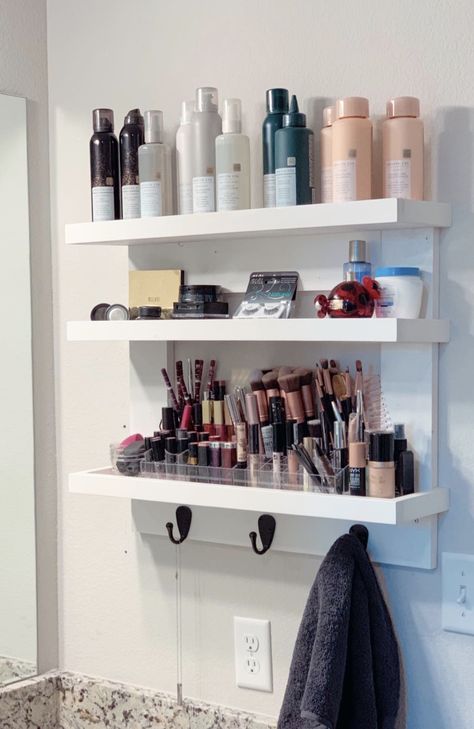 DIY makeup hair care wall shelf and shelving with hooks. Makes great bathroom storage when you don’t have drawers. Do it yourself. Easy shelf. Shelves With Hooks Bathroom, Makeup Shelf Ideas Bathroom, Bathroom Makeup Shelves, Small Bathroom Makeup Organization, Makeup Bathroom Storage, Makeup Wall Shelves, Makeup Wall Storage, Wall Makeup Storage, Makeup Shelves On Wall