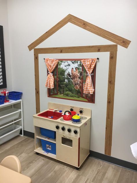 Daycare Shelving Ideas, Infant Room Dramatic Play, Classroom Layout Daycare, Cubby Picture Ideas Preschool, Daycare Corner Ideas, Parent Wall Daycare, Childcare Classroom Setup, Home Childcare Basement, Art Center Daycare