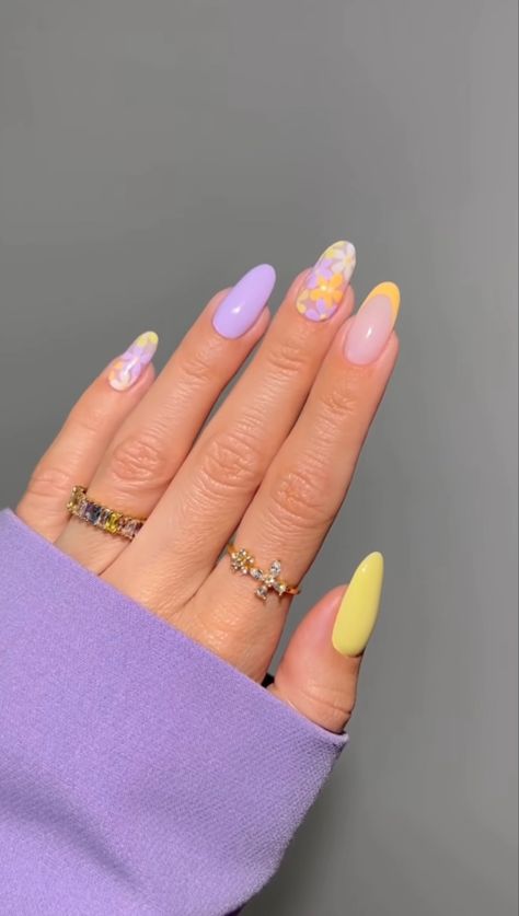 URPLE AND YELLOW ACRYLIC NAIL WITH FLOWER NAIL ART AND PURPLE AND YELLOW FRENCH TIP Summer Nails Trendy Yellow, Short Nail Designs Yellow And White, Lavender French Tip Nails Almond With Flowers, Yellow Flowers Nail Art, Purple And Yellow Almond Nails, Purple And Yellow French Tip Nails, Yellow Spring Nails 2023, Purple Nails With Yellow Flower, Pink And Yellow Spring Nails