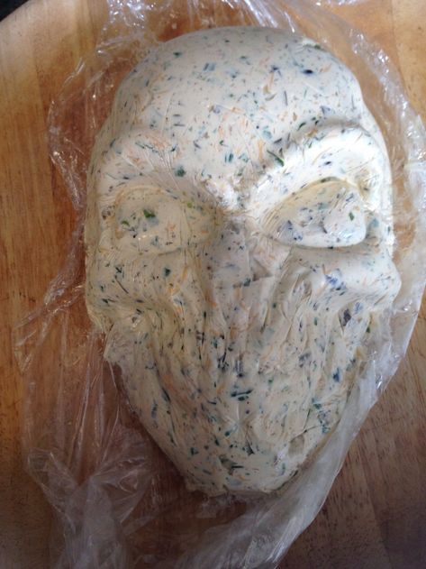 Turn molded cheese mixture onto serving tray and gently remove the plastic wrap. Quiche Florentine, Homemade Corn Tortillas, Spicy Cheese, Skeleton Face, Jalapeno Cheese, Corn Tortilla Chips, Jalapeno Cheddar, Cheese Spread, Halloween Mask