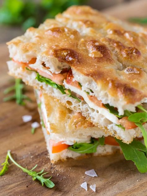 Caprese focaccia sandwich • Electric Blue Food - Kitchen stories from abroad Caprese Focaccia Sandwich, Foccacia Sandwich Vegetarian, Focaccia Sandwich Vegetarian, Focaccia Sandwich Recipes, Italian Focaccia Sandwich, Foccacia Panini, Foccacia Sandwich Ideas, Foccacia Sandwich Recipes, Foccacia Bread Sandwiches