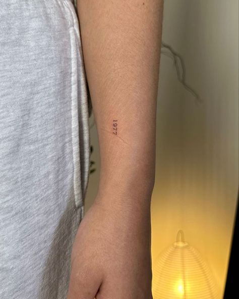 Birth Year Roman Numeral Tattoo, Year Number Tattoo, 70 Times 7 Tattoo, Small Number Tattoo Placement, 1936 Tattoo, Dainty Family Tattoos, Date Of Birth Tattoos Children, Date Tattoo Fonts, Birthyear Tattoo Ideas