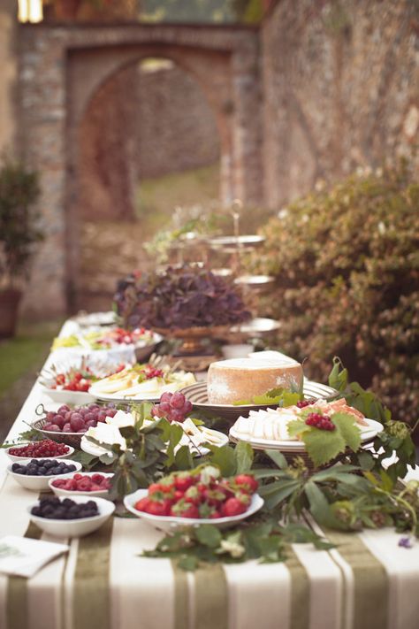 Appetizer table with flowers in Italy for this wedding reception   Read More: http://stylemepretty.com/2013/09/12/romantic-italian-destination-wedding-from-matthew-moore-photography/ Outdoor Buffet Tables, Outdoor Buffet, Buffet Dessert, Appetizers Table, Buffet Table Decor, Food Buffet, Table Decorating, Tuscan Wedding, Party Buffet