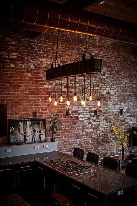 Exposed duct pipes, brick walls and lighting create a distinct modern industrial style in the kitchen Brick Wall Ideas, Industrial Decor Kitchen, Urban Industrial Decor, Kitchen Table Lighting, Industrial Kitchen Design, Loft Kitchen, Industrial Style Kitchen, Loft Industrial, Vintage Industrial Decor