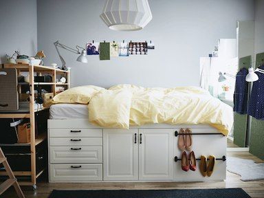 This ikea hack for storage with a platform bed made out of kitchen cabinets Small Bedroom Storage Solutions, Diy Storage Bed, Office Hacks, Downstairs Bedroom, Ikea Office, Small Bedroom Storage, Storage Solutions Bedroom, Tiny Room, Diy Platform Bed