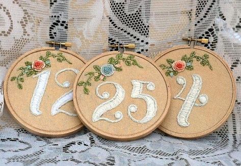 Wedding Table Numbers for Every Theme Number Embroidery, Cross Stitch Wedding, Unique Table Numbers, Wedding Embroidery Hoop, Stitch Wedding, Wedding Photo Display, Floral Table Numbers, Embroidery Hoop Crafts, Wedding Embroidery