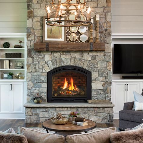 With a graceful arch, the Cerona gas fireplace adds style and warmth, with seamless, cantilevered corners and textured detail. Gas Fireplace Ideas, Gas Fireplace Ideas Living Rooms, Indoor Gas Fireplace, Corner Gas Fireplace, Fireplace Fronts, Fireplace Heat, Gas Fireplace Insert, Gas Fireplace Logs, Fireplace Built Ins