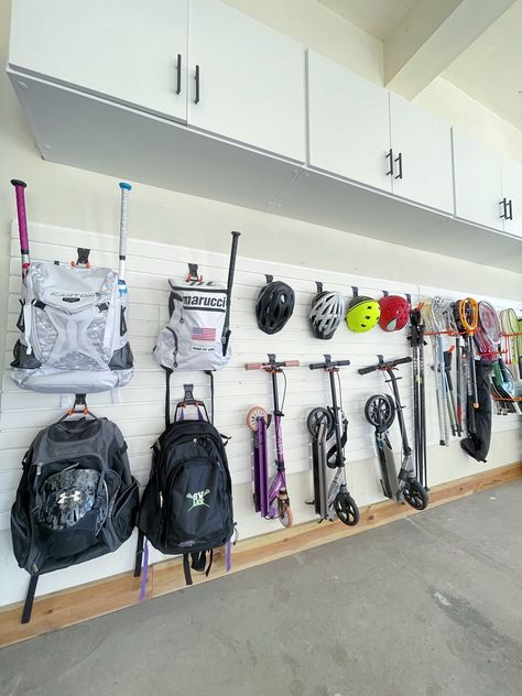 Garage Storage Ideas Bikes, Garage Clothing Storage Ideas, Garage Sports Storage Ideas, Garage Sports Bag Storage, Sports Storage In Garage, Sports Storage Garage, Sport Storage Garage, Cooler Storage Ideas Garage, Baseball Garage Storage