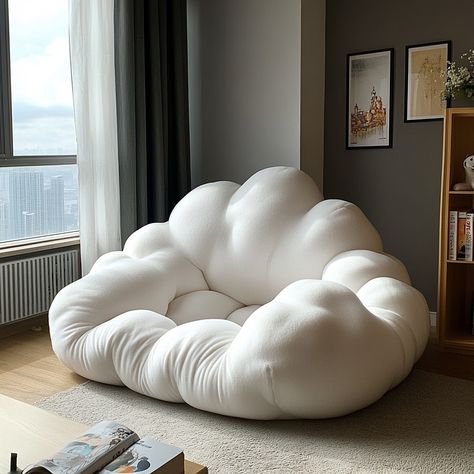 The Cloud Bean Bag is a plush, cloud-shaped seat that brings ultimate comfort and relaxation to any space. Designed to resemble a soft, fluffy cloud, its rounded, gentle contours and cushioned form cradle your body, offering a cozy place to lounge. Made from premium, breathable fabric and filled with high-density foam, this bean bag molds to your shape, providing ergonomic support. Perfect for reading, napping, or simply unwinding, the Cloud Bean Bag adds a whimsical, nature-inspired touch to... Room Seating Ideas Bedrooms, Cloud Furniture, Cloud Chair, Cloud Room, Bean Bag Office, Magnolia Room, Wide Chair, Cloud Bed, Cloud Decor