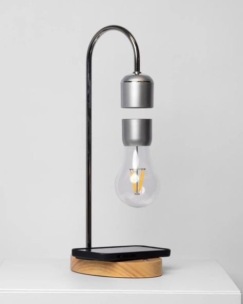 This remarkable lamp not only illuminates your space with a gentle, warm glow but also astonishes with its unique levitating light bulb, held aloft by the power of magnets. The magic extends beyond mere levitation. Hidden within the lamp’s base is a powerful wireless phone charger, discreetly blending technology with function. 🔍 Product: Levitating Lamp (Wireless Charger) 👆 Tap the link in bio for more lamps! . . . . . . . . . . . . . . . . . . #decorcrushing #interior4u #interior4inspo #sa... Levitating Lamp, Mood Light, Unique Lamps, Modern Accents, Accent Lighting, Ultra Modern, A Dream Come True, Lighting Lamps, Phone Charger