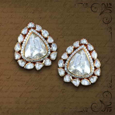 A perfectly matched pair of Diamond Polki studs in an elegant vintage setting. As part of a signature line from our Maharani Collection, they are inspired by the subtle elegance of Her Royal Highness, Sita Devi Sahiba of Kapurthala. The Maharani Collection is exclusively available at our flagship store at Hotel Narain Niwas Palace. #SurabhiFineCraftedJewels #MaharaniCollection #heritagejewels #soliairepolkis #subtlelegance #jadaujewels #diamondpolki #polkipair #royalsoftheraj #jewelsandgemstones Mozonite Sets, Polki Earrings Studs, Polki Studs Earrings, Polki Pendant Set, Sita Devi, Polki Studs, Vintage Indian Jewelry, Vintage Setting, Her Royal Highness