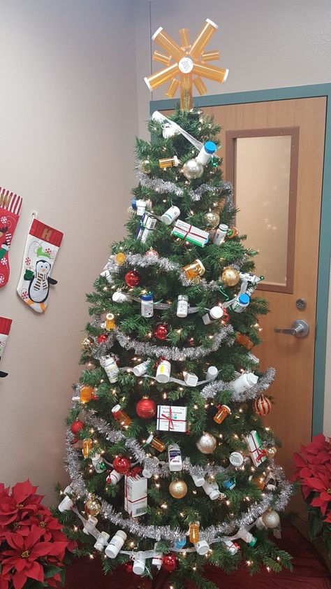 Healthcare Christmas Tree Ideas, Pharmacy Themed Christmas Tree, Healthcare Christmas Tree, Healthcare Christmas Decorations, Pharmacy Holiday Decorations, Medical Christmas Tree, Christmas Pharmacy Decorations, Christmas Hospital Decorations, Pharmacy Christmas Tree