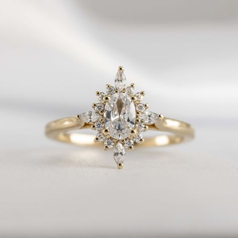 Discover our stunning Revel halo diamond engagement ring. We’ve designed this ring for anyone seeking a glamorous, modern update on a halo style. Shop now. Diamond Alternative Engagement Ring, Halo Moissanite Engagement Ring, Gold Diamond Hoop Earrings, Future Engagement Rings, Moissanite Engagement Ring Oval, Oval Moissanite, Engagement Ring Guide, Halo Style, Dream Engagement Rings