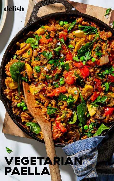 This Vegetarian Paella Is Loaded With All Your Favorite FlavorsDelish Vegetarian Paella Spanish, Veggie Paella Recipe, Spanish Healthy Recipes, Paella Recipe Vegetarian, Vegetarian Paella Recipe, Paella Vegetarian, Veggie Paella, Paella Recipes, Vegetable Paella