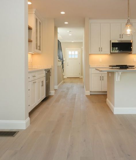 Neutral Floors And Walls, Wood Floor With White Cabinets, White Oak Floors With Cream Walls, Basement Light Flooring, Simple Flooring Ideas, Kitchen Ideas Light Floors, Lvp Light Wood Floors, Wooden Flooring For Kitchen, Transitional Wood Flooring Ideas