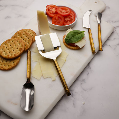 Here are some of our cheese knife sets and artisan-crafted marble cheese boards. You'll be ready for holiday hosting with distinctive hand-forged stainless steel cheese knives that complement our artisan-made flatware designs. Shop now and be ready for the holidays! Flatware Design, Marble Cheese Board, Holiday Hosting, Cheese Knife Set, Hosting Holidays, Cheese Knife, Artisan Cheese, Cheese Boards, Wood And Marble