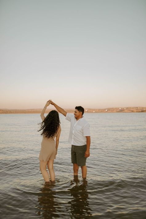 lake | couple | photoshoot | golden hour | couples photoshoot | sunset | couple poses in water Poses In Water, Couples Photoshoot Sunset, Lake Couple Photoshoot, Dock Photoshoot, Water Engagement Photos, Photoshoot Golden Hour, Romantic Engagement Pictures, Lake Couple, Ring Pic