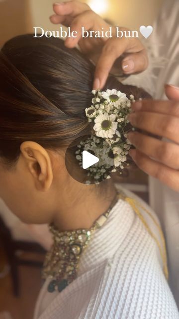 pratiksha NP on Instagram: "“Double braid bun “ in the making 🤍

Hair: @hairbypratiksha 

#trendinghairstyles #bridalhair #bridesofinstagram #uniquehair #bridesbypratikshaverma #trendinghairstyles #haircreation #hairlove #weddingbun #indianhairstyles #weddinghairstyles #mumbaihairstylist
#bridalhairdo #bridesofsouthindia 
@wedmegood @weddingsutra @weddingbazaarofficial @thebridesofindia @witty_wedding @wedabout @weddingwireindia @weddingbazaarofficial @weddingbazaarfashion @thebridesofindia" Hair Bun With Flowers, Flower Bun Hairstyle, Mehndi Hairstyles, Wedding Bun, Braid Bun, Flower Bun, Bridal Hairdo, Tutorial Ideas, Double Braid