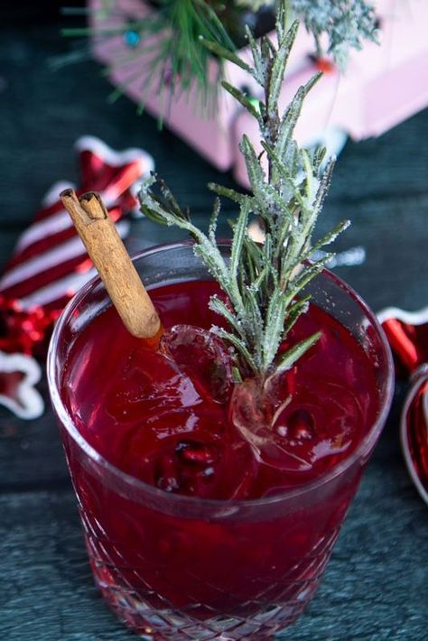 🍹 A Mistletoe Kiss Cocktail is a delicious libation to serve at your holiday party, Christmas dinner or any time you want an amazing refresher! Vodka-based, with splashes of Campari, Cointreau, pomegranate juice & lime juice, it’s got the makings of a wintery wonderland!❄️❄️☃️☃️ Mistletoe Mojito Recipe, Kissing Santa Clause Cocktail, Mistletoe And Martinis Party, Mistletoe Kiss Cocktail, Cranberry Rosemary Cocktail Vodka, Kiss Cocktail, Rosemary Cocktail, Mistletoe Kiss, Ginger Syrup