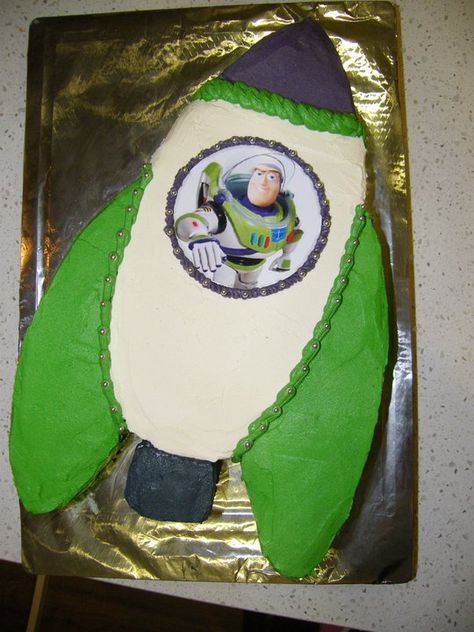 Buzz Lightyear rocket cake Buzz Lightyear 3rd Birthday Cake, Rocketship Cupcake Cake, Buzz Lightyear Cupcake Cake, Spaceship Cake, Buzz Birthday, Buzz Lightyear Cake, Buzz Lightyear Birthday Party, Buzz Lightyear Party, Buzz Lightyear Birthday