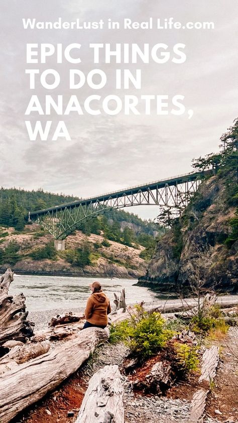 Woman with back facing wearing a baseball hat and fleece sitting on a log that has been washed by the water near the waters edge with deception pass bridge near Anacortes, WA and Whidbey island in the background. Words on screen read "WanderLust in Real Life.com Epic Things to do in Anacortes, WA" Anacortes Washington Things To Do, Burlington Washington, Oregon Coast Roadtrip, Washington Things To Do, Anacortes Washington, Washington Travel, Rv Adventure, San Juan Islands, Travel Games