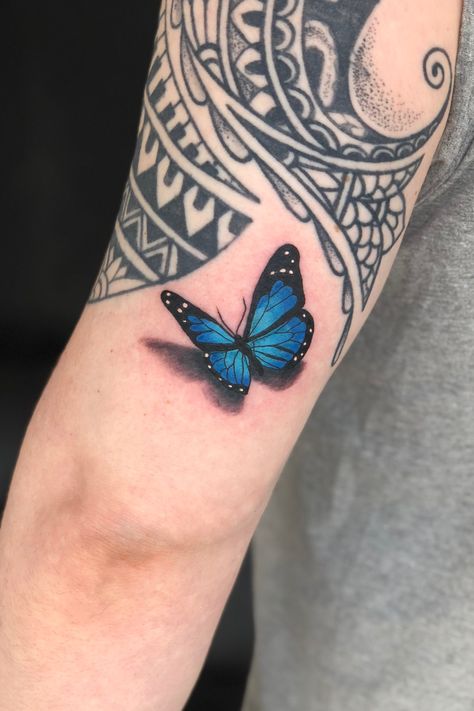 Butterfly Ocean Tattoo, Blue Butterfly Tattoo Men, Dark Blue Butterfly Tattoo, Blue Tattoos On Brown Skin, Blue Morpho Tattoo, Elbow Tattoo Sleeve, Blue Monarch Butterfly Tattoo, Black And Blue Butterfly Tattoo, Blue Morpho Butterfly Tattoo