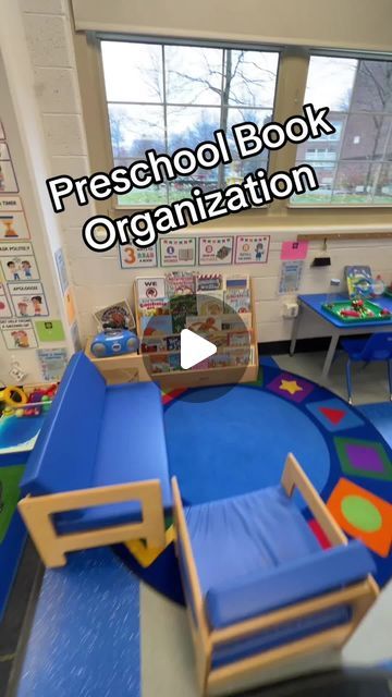 Preschool Vibes on Instagram: "Take a peek at how I organize books in my preschool classroom! 📚✨ Behind my desk, I have a bookshelf where all our books are neatly arranged by theme and in the order I teach them. When it’s time to switch themes, I simply grab the entire stack for the new theme. I select my favorite read-alouds and place them in a basket next to my chair in the carpet area, making them easily accessible for story time. The rest go into our preschool library center, where students can explore and enjoy them at their leisure. This system keeps everything organized and ensures that our books are always ready for the next adventure in learning!" Preschool Library Center, Preschool Reading Corner, Preschool Decoration, Preschool Vibes, Library Corner, Preschool Library, Organize Books, Library Center, Preschool Reading