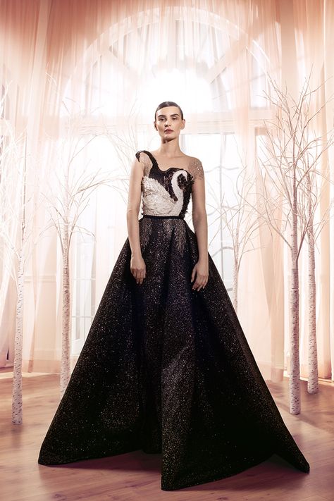 This incredible black, swan inspired #gown is perfectly dramatic! | Hamda Al Fahim Spring/Summer 2017 Collection | WedLuxe Magazine | #WedLuxe #Wedding #luxury #weddinginspiration #luxurywedding #fashion Hamda Alfahim, Ballet Gown, Swan Feathers, Hamda Al Fahim, Black Feather Dress, Swan Dress, Flat Beads, Jeanne Lanvin, Dress Luxury